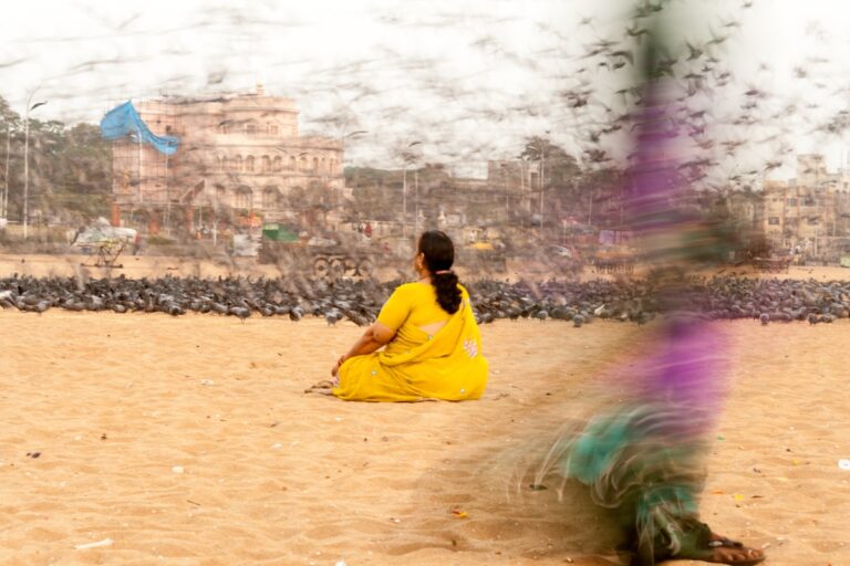 Mental Health Apps: Helpful Tool or Digital Placebo? A woman meditating calmly at home